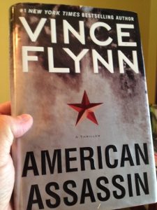 This copy of American Assassins, by Vince Flynn, traveled all the way around the world, as Melinda's companion to South Africa.