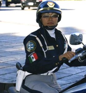 A female Mexican police officer like this one wasn't happy with my stupid driving in Playa del Carmen last week.