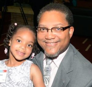 Calvin Allen celebrated the MSP Business Journal Diversity Leader of the Year award with his daughter.