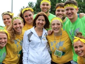 Becky Bergman was surrounded by blossoming college students as she celebrated her first year as President of Gustavus Adolphus College.