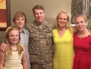 Mike applied the "IPAD" strategy: Integrity, Positive Attitude and Dedication with his family at his retirement from the Reserves.