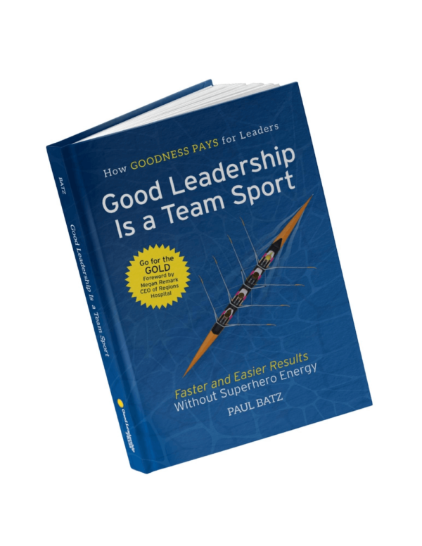 Blue book with white text saying Good Leadership is a Team Sport